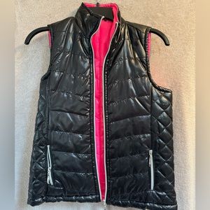 Black and hot pink reversible vest, size small
